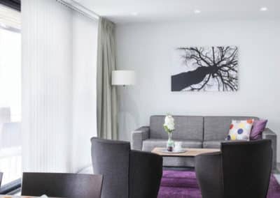 Sofa and chairs in Black Pearl hotel suite