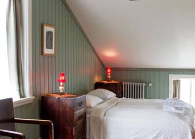 The made bed in Hotel Flatey suite